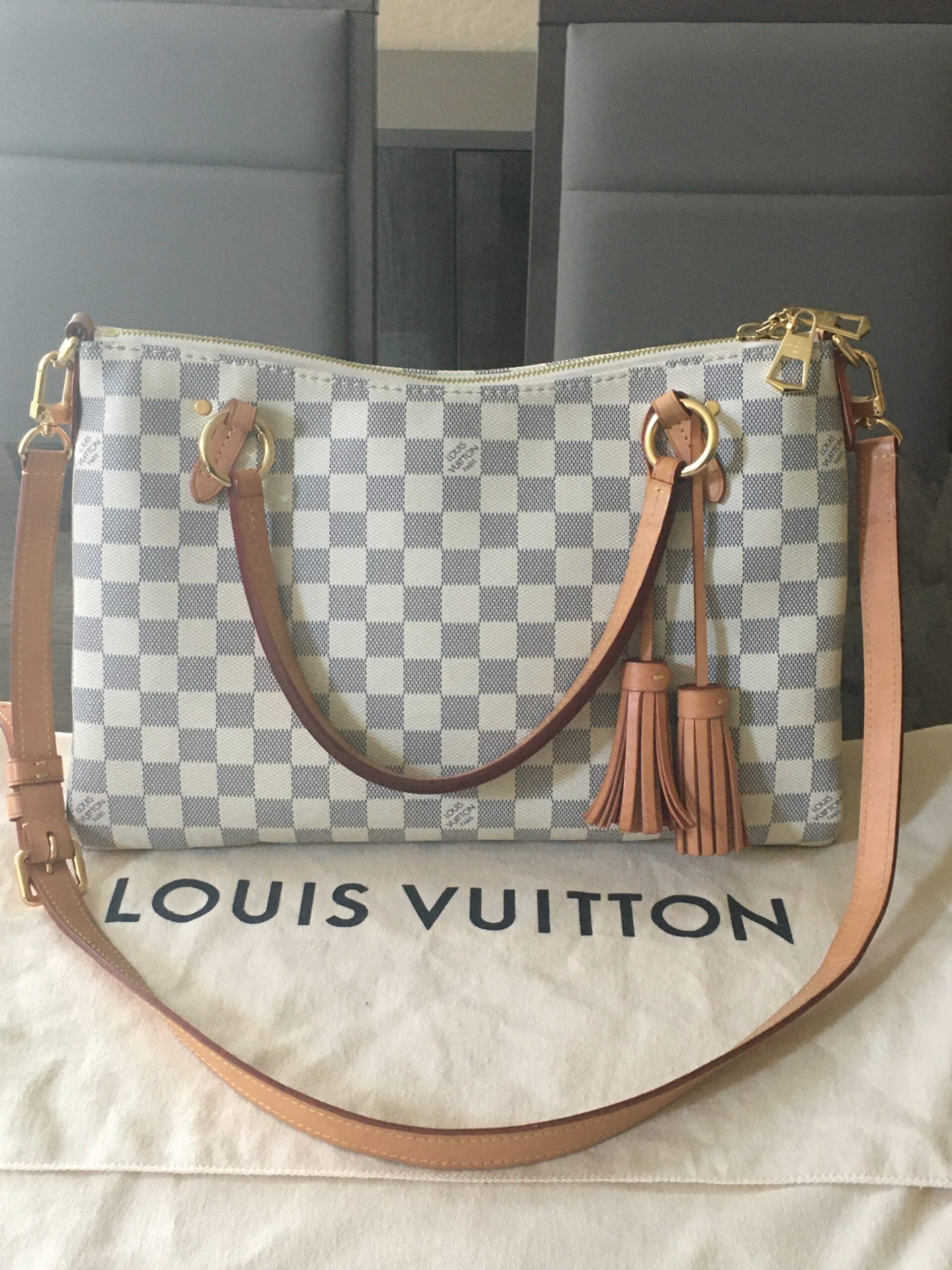 Louis Vuitton Damier Azur Lymington N40022 is just perfect for any